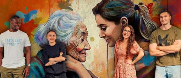 Lernende der Pflegeschule stehen vor großem Graffiti