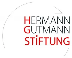 Schrift mit Hermann Gutmann Stiftung in rot und schwarz mit Kreis